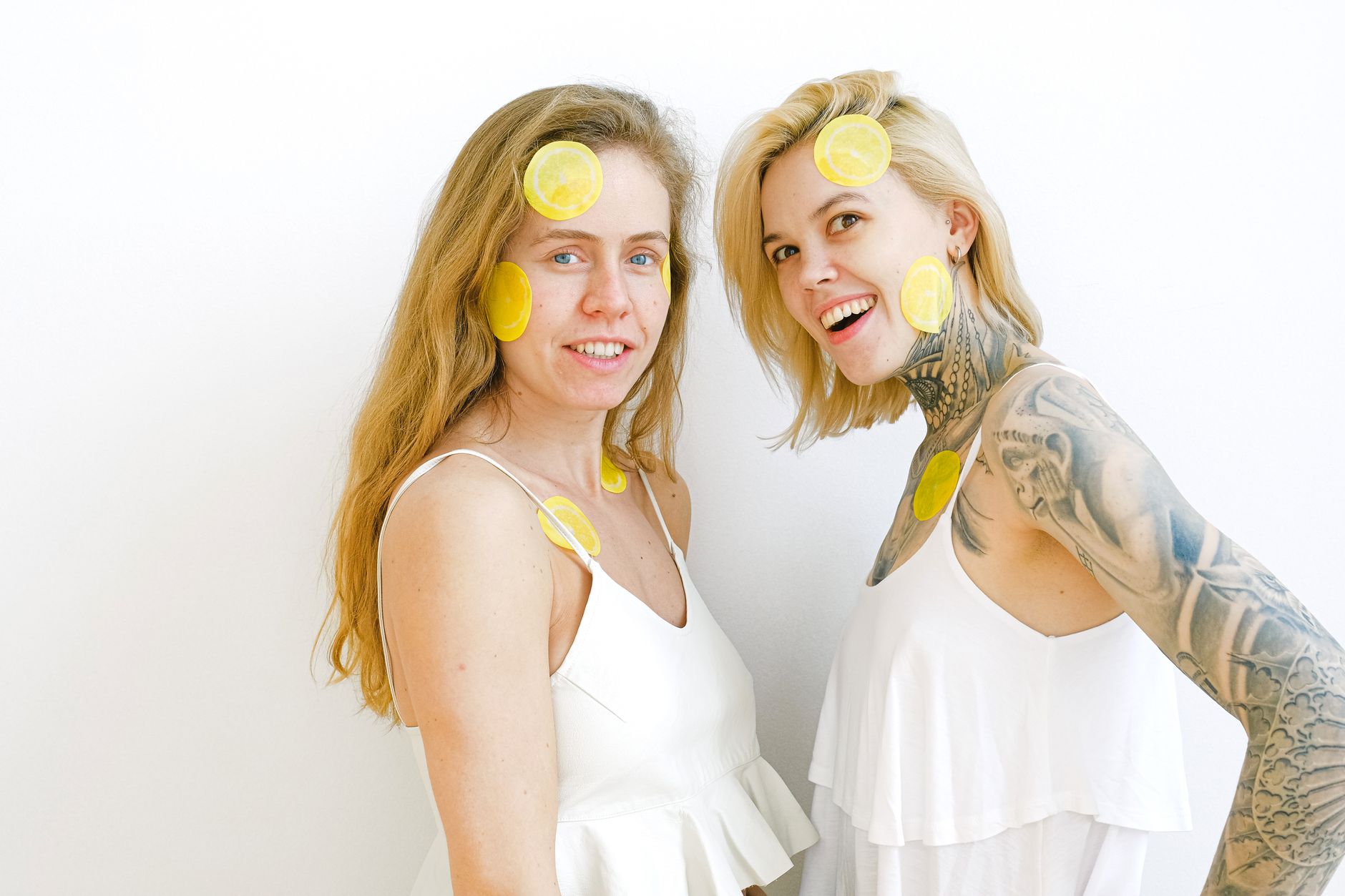 Two women laughing together with intimate joy