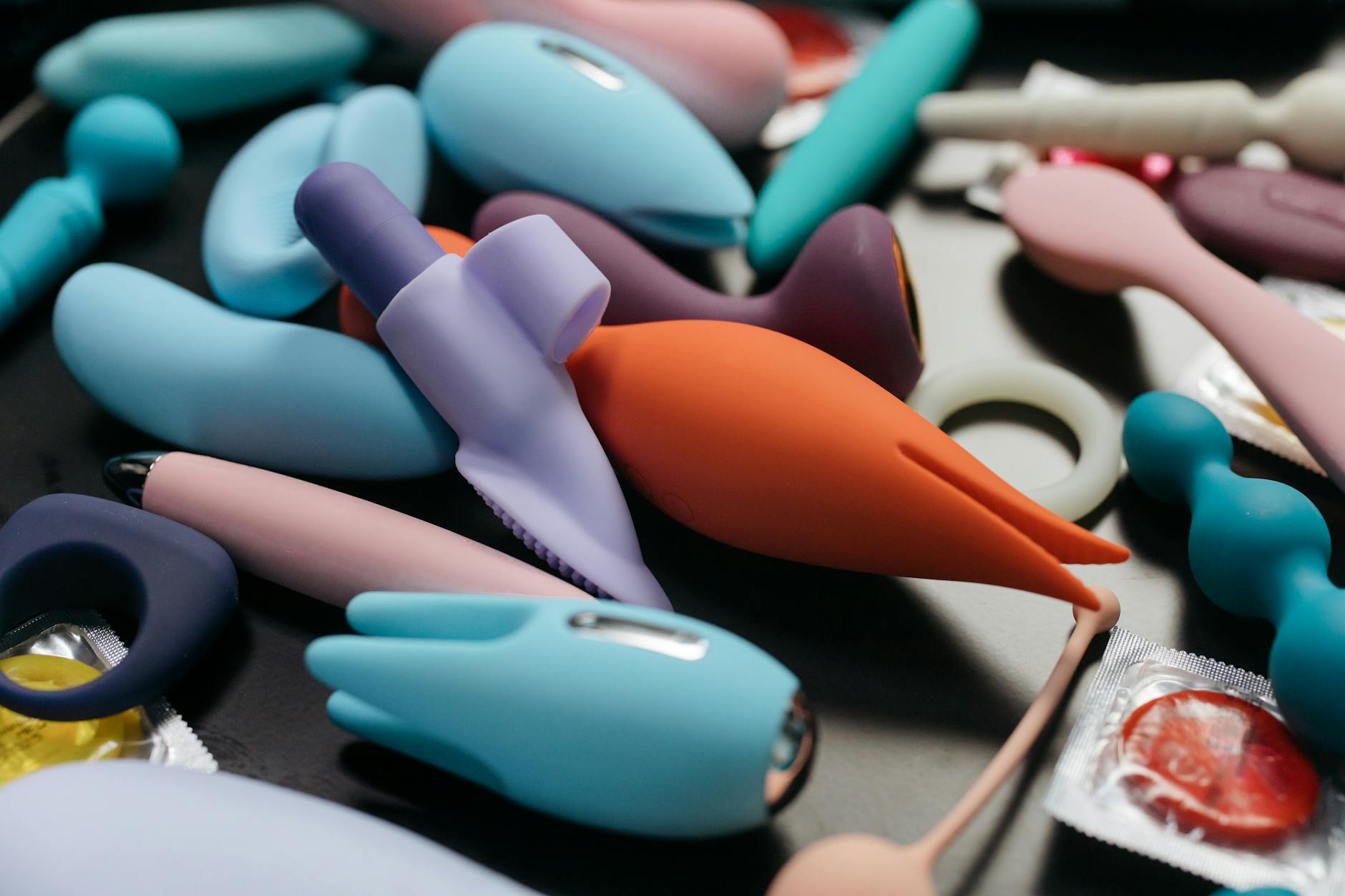 Hands holding a blue personal massager, symbolizing intimate connection after recovery